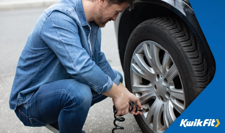checking the tyre pressure